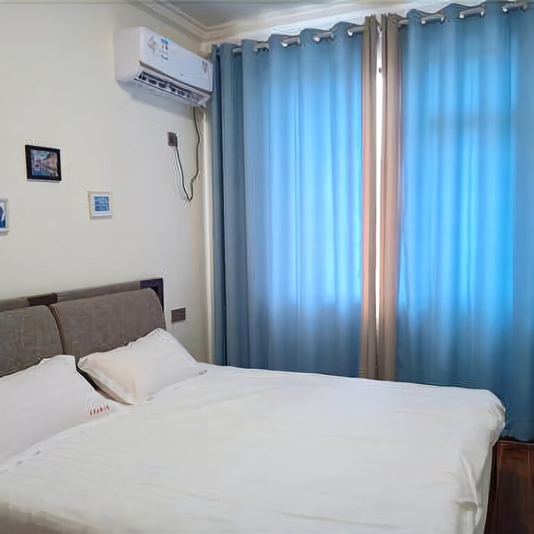 Жангжоу: Mingbang Holiday Apartment