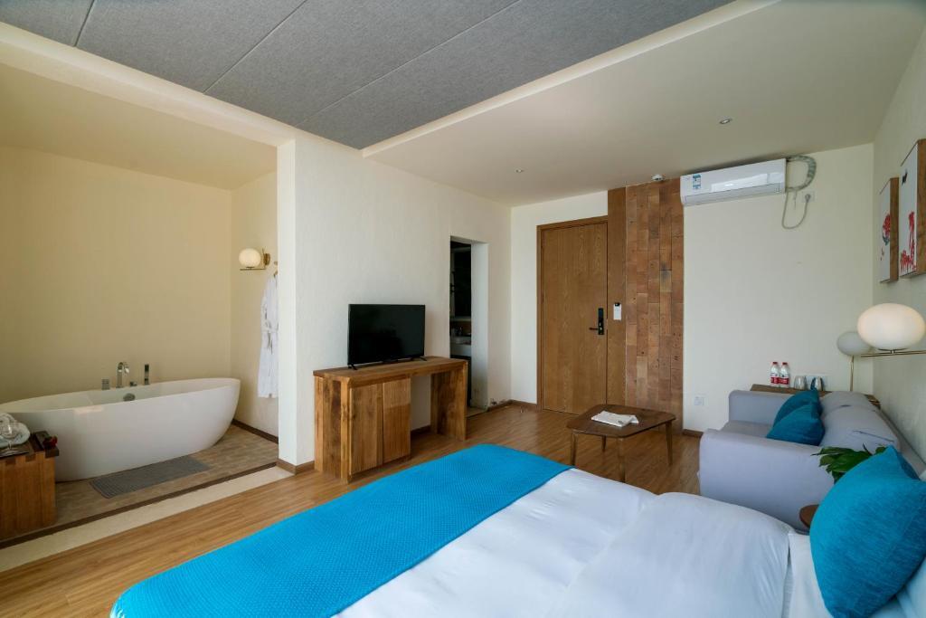Дали: Dali Erhai Baishe Seaview Inn