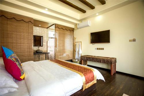 Лицзян: Lijiang Zhuohuayuan Boutique Inn