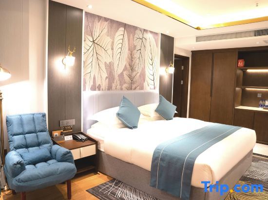 Цзинхун: XiShuang Banna Yue Ying Fu Xing Hotel
