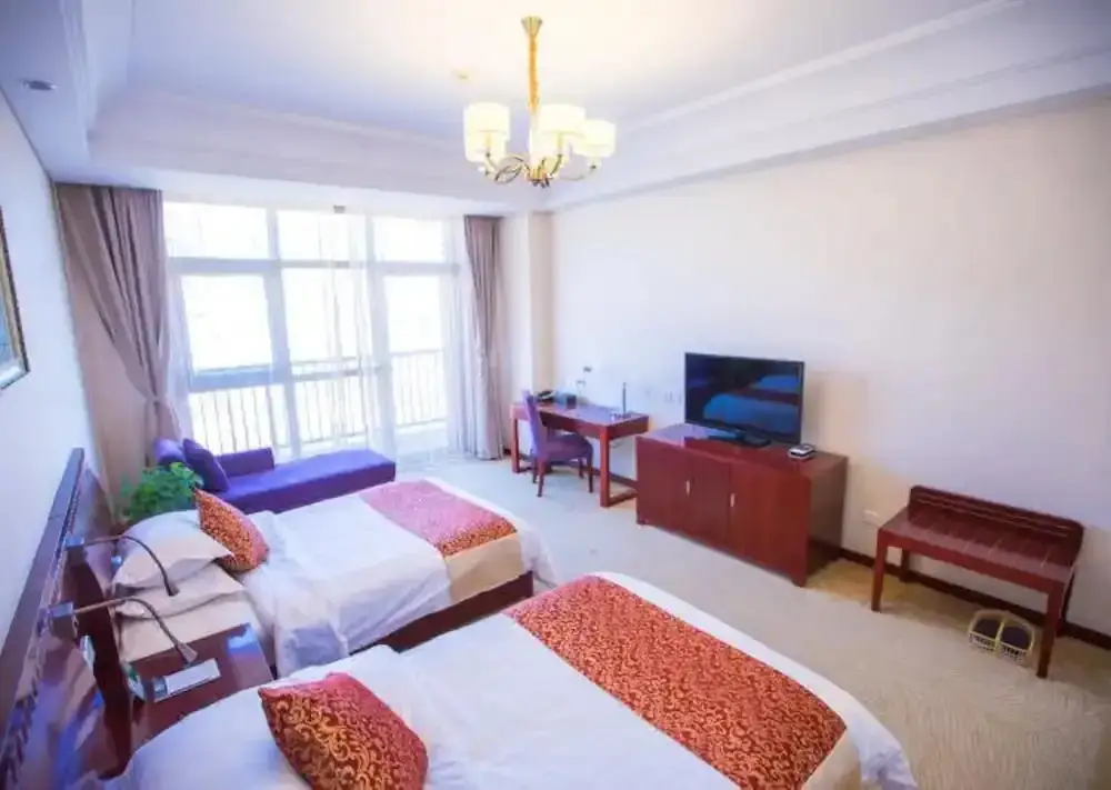 Циндао: Qingdao Rouhigh Hotel