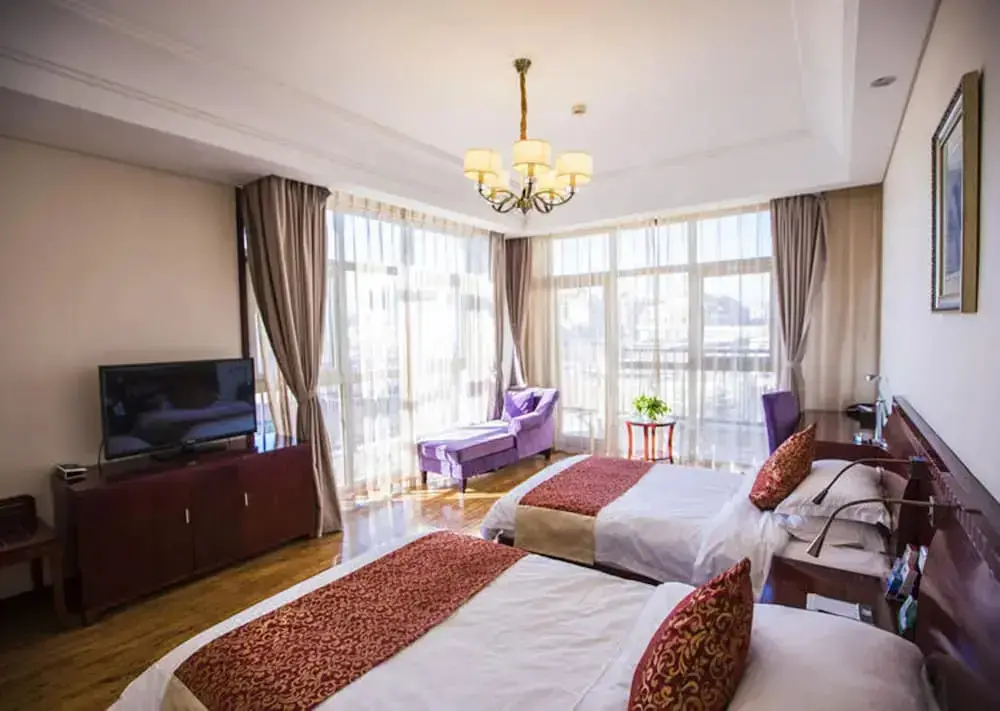 Циндао: Qingdao Rouhigh Hotel