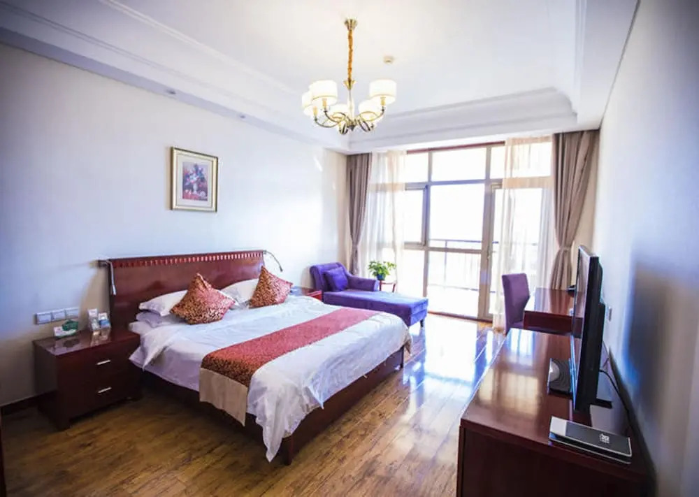Циндао: Qingdao Rouhigh Hotel