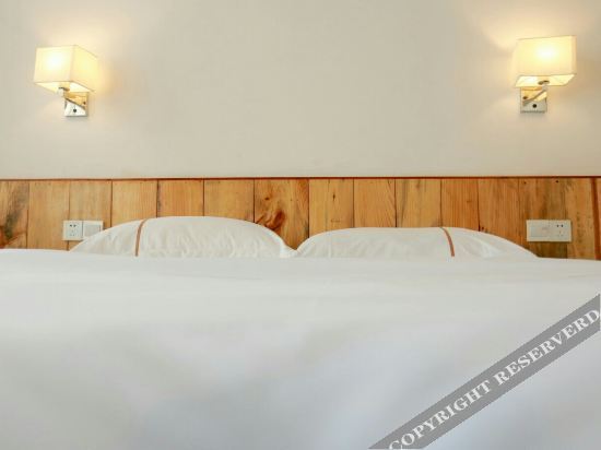 Байсе: Muxin Jiayuan City B&B