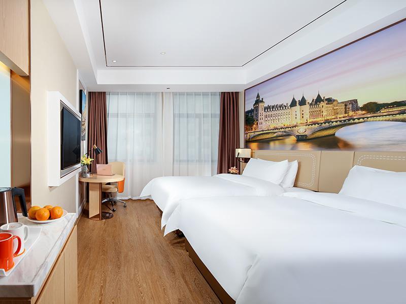 Байсе: Vienna Hotel Guangxi Baise Xilin County Juting Cultural Arts Center
