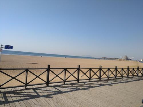 Циндао: Qingdao Getoom Golden Beach Apartment