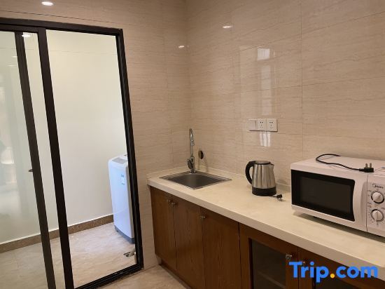 Миян: HomeJoyler Vacation Apartment (Yunling Shengshi Jiayuan)