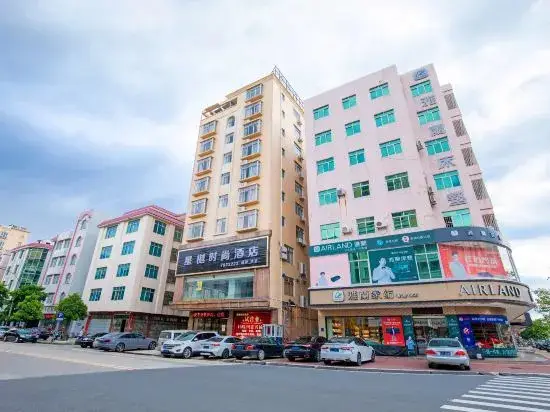 Маоминг: Huazhou Xingxuan Fashion Hotel