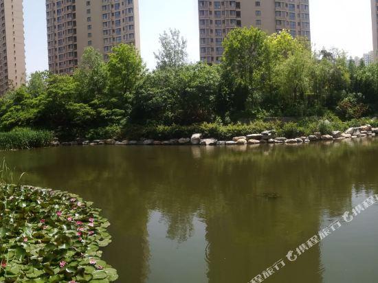 Далянь: Querju Seaview Apartment Hotel