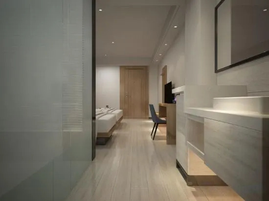 Чжухай: Zhuhai New Aolin Apartment (Tangjiawan Station)