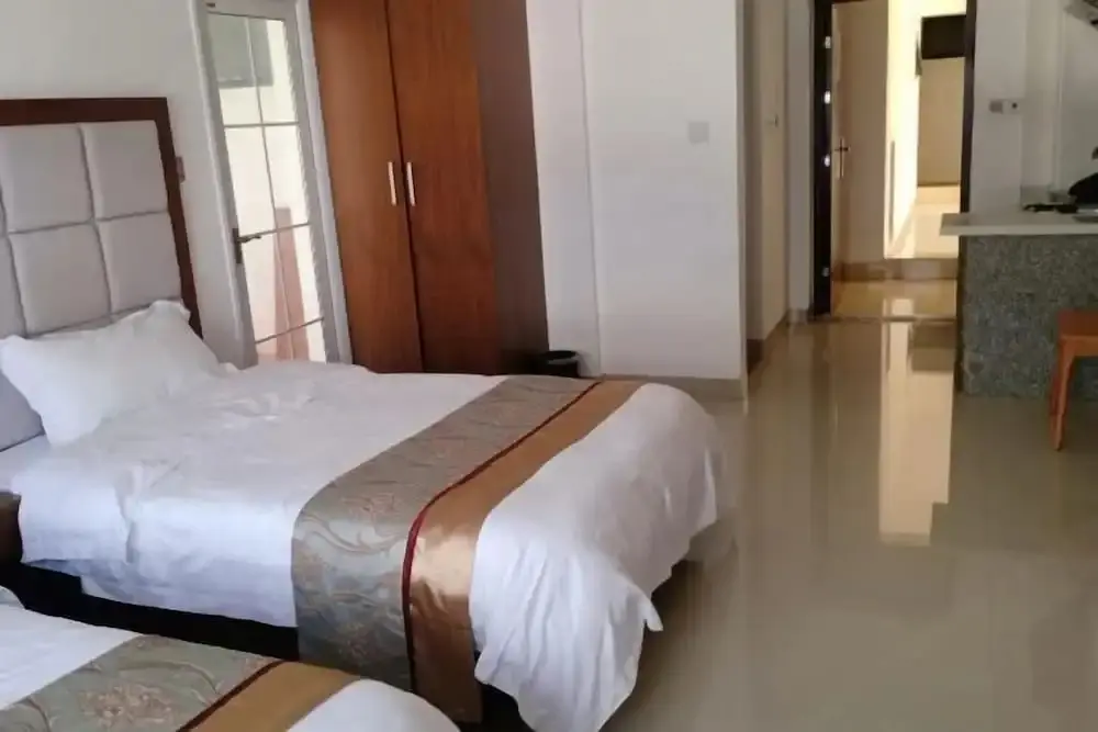 Учжишань: Coconut Maple Home Apartment