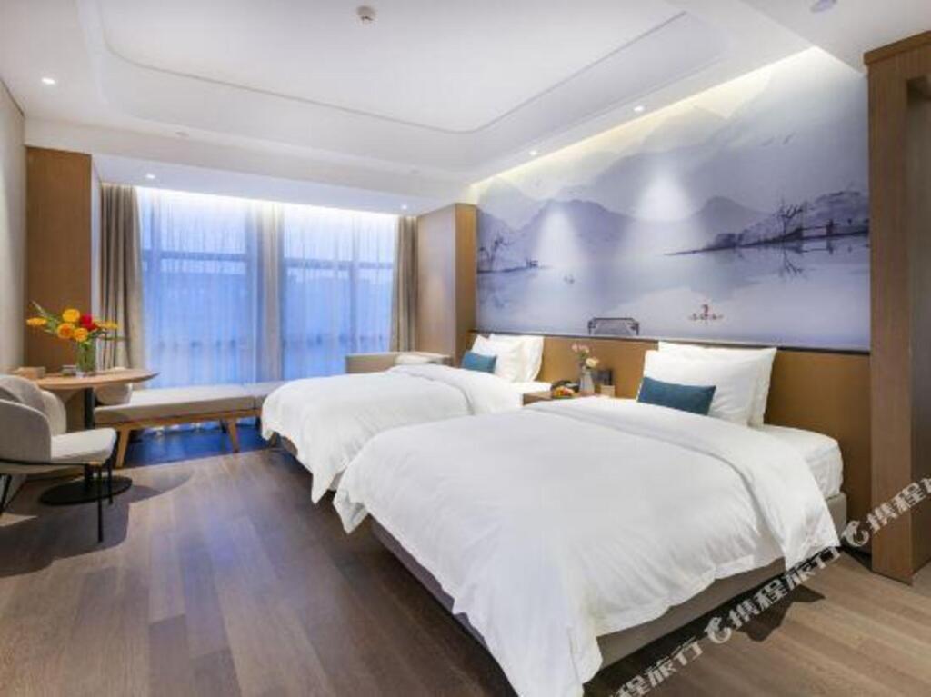 Ханчжоу: New Century Manju Hotel (Hangzhou Xindeng Fuchungang)