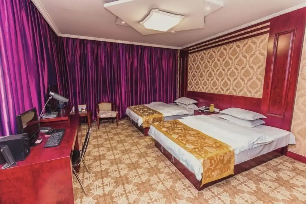 Линьи: Jundu Business Hotel