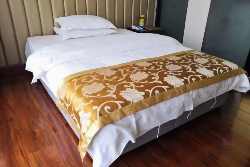 Линьи: Jundu Business Hotel