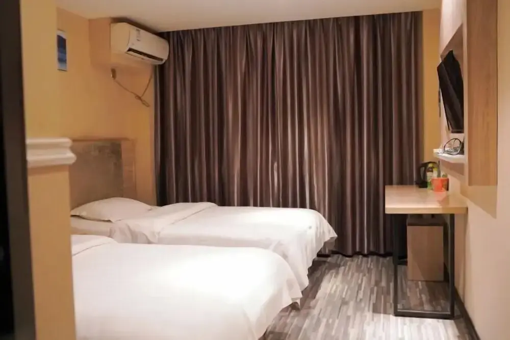Хуанши: Xingelin Business Hotel