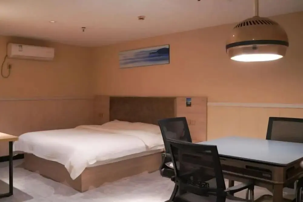 Хуанши: Xingelin Business Hotel