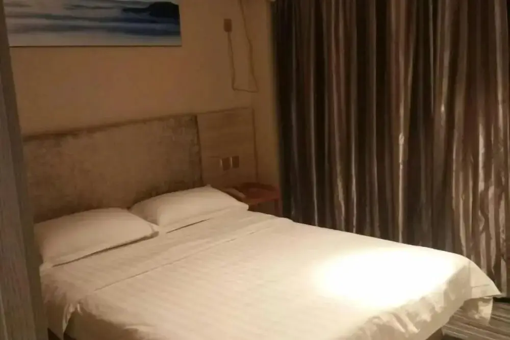 Хуанши: Xingelin Business Hotel