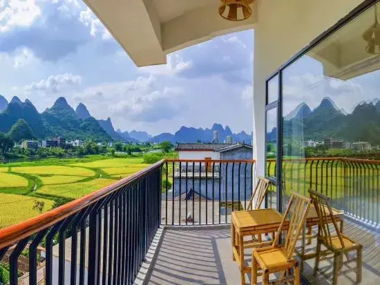 Яншо: Yangshuo Yuchishe Homestay (Yulonghe Zhuyu Drifting Jinlong Bridge Wharf)