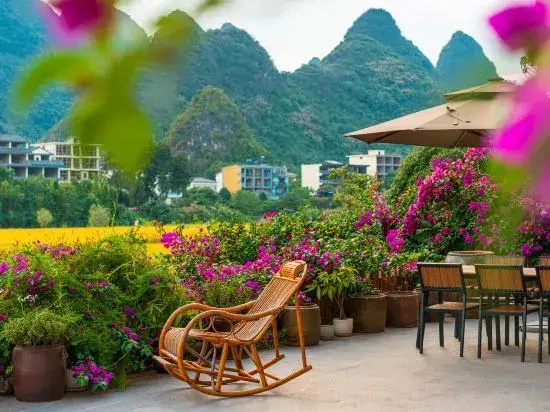 Яншо: Yangshuo Yuchishe Homestay (Yulonghe Zhuyu Drifting Jinlong Bridge Wharf)