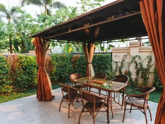 Цзинхун: Xishuangbanna Jinghong Jinlong Jiarui Hot Spring Holiday Villa