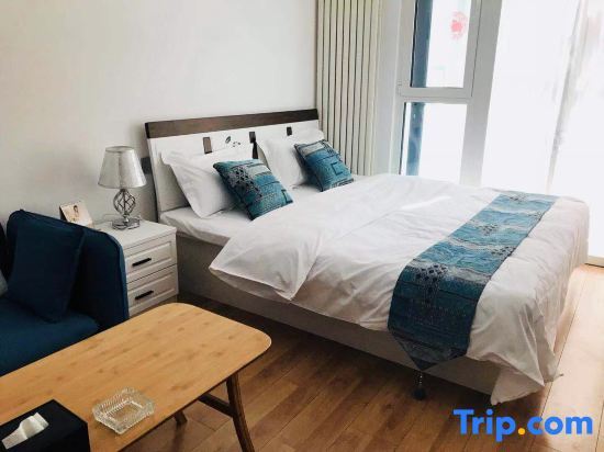 Циндао: Qingdao Yuxuke Apartment