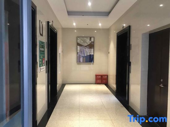 Циндао: Qingdao Yuxuke Apartment