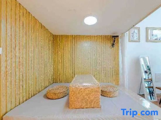 Циндао: Qingdao Yuxuke Apartment