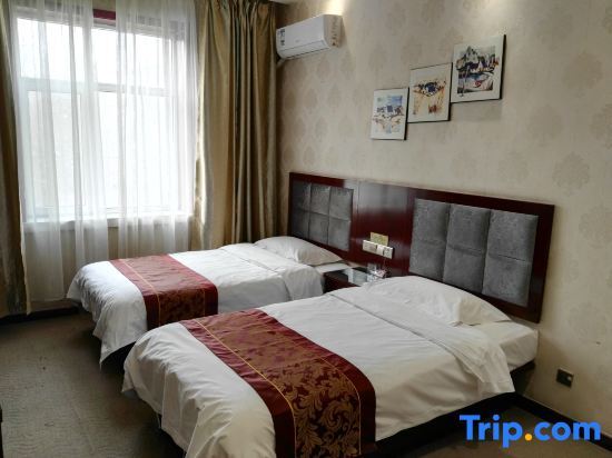 Шихези: Shihezi Shengxing Business Hotel