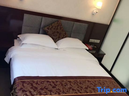 Шихези: Shihezi Shengxing Business Hotel