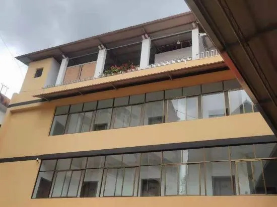 Мынла: Mengla Yishang Business Hotel