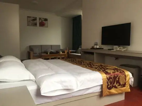 Мынла: Mengla Yishang Business Hotel