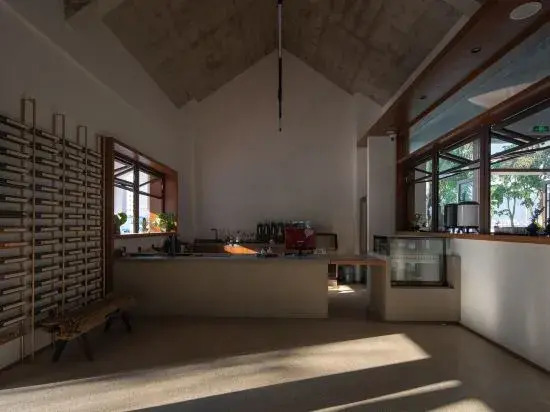 Менхай: Xishuangbanna Bohai Mulan Tea House