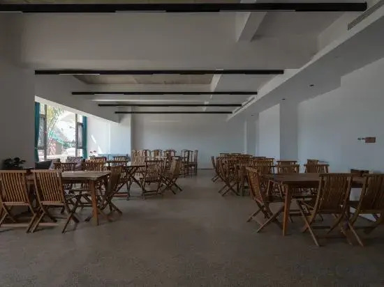 Менхай: Xishuangbanna Bohai Mulan Tea House
