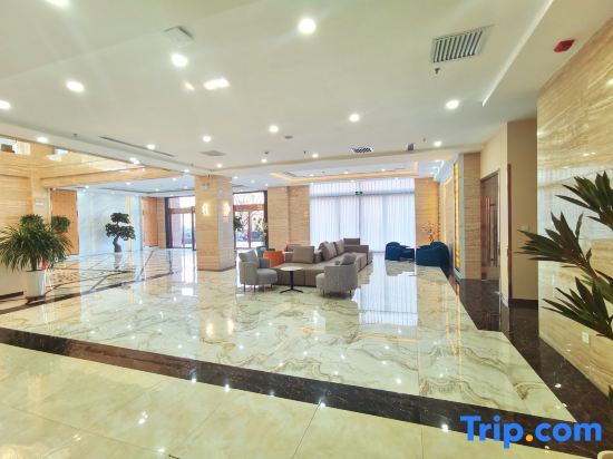 Лунси: Hualijing Hotel, Xiwen (Xixi Station)
