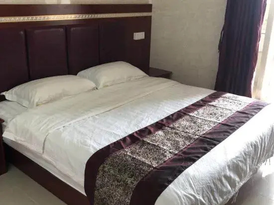 Чжуншань: Zhongshan Junyi Business Apartment
