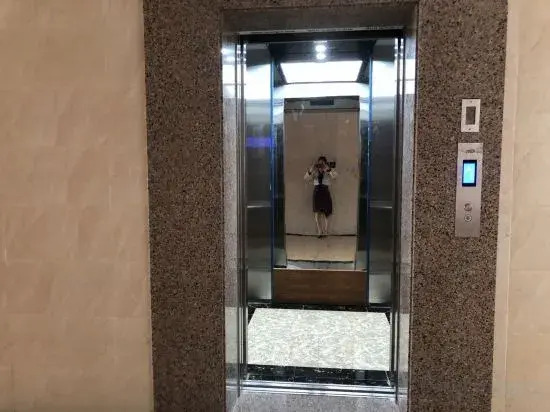 Чжуншань: Zhongshan Junyi Business Apartment
