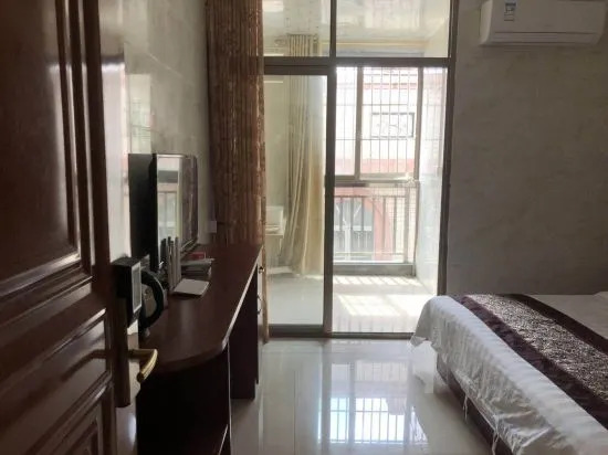 Чжуншань: Zhongshan Junyi Business Apartment