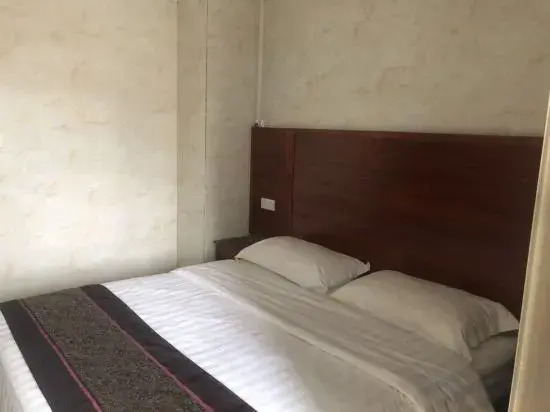 Чжуншань: Zhongshan Junyi Business Apartment