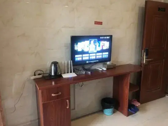 Чжуншань: Zhongshan Junyi Business Apartment