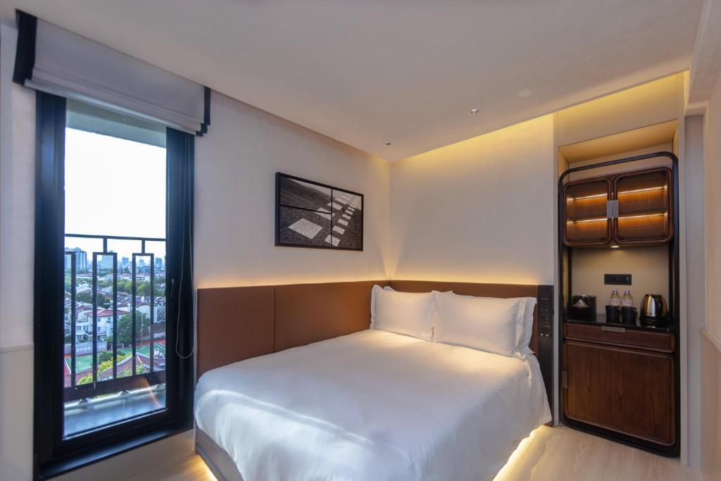 Шанхай: Mia Hotel - Shanghai Shaanxi South Road