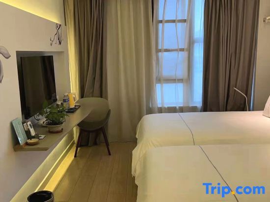 Хэфэй: Magnolia Hotel (Hefei Feidong New District Yuzhou Central Plaza)