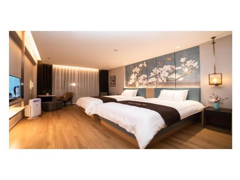 Хулудао: Magnolia Hotel (Xingcheng Central Plaza Wenquan Street store)
