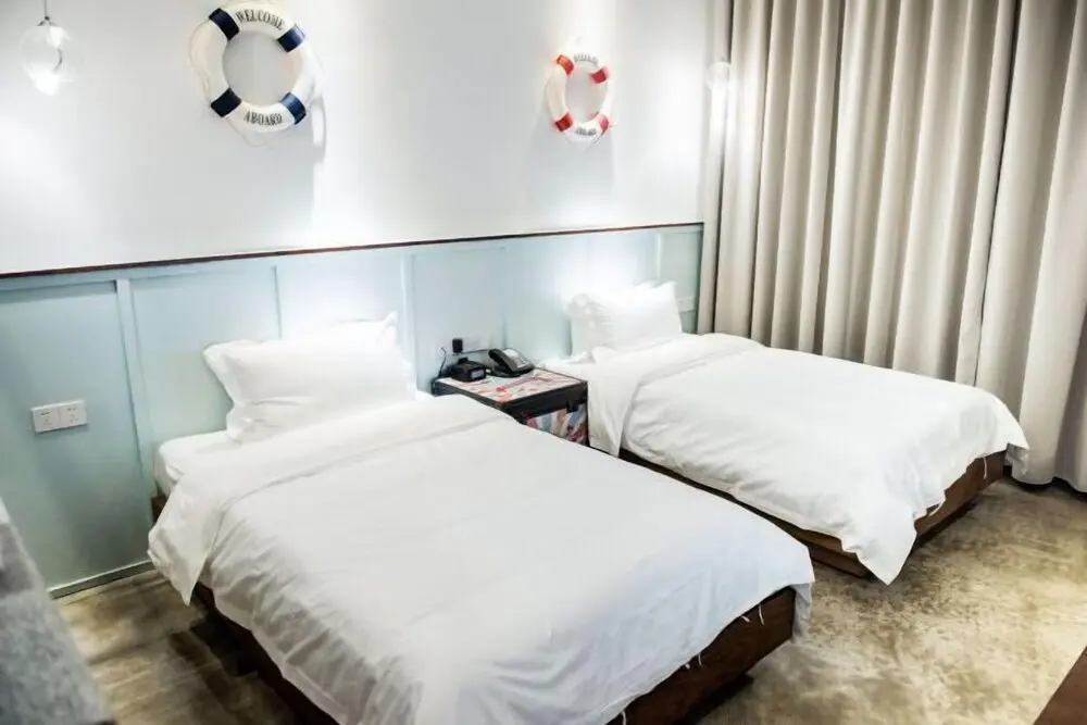 Хайкоу: Jinglan Loft Boutique Hotel (Haidian Island Heping Avenue)