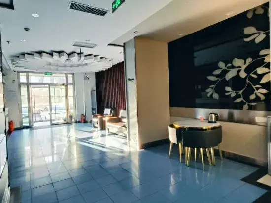 Huayi Hotel (Harbin CapitaLand Airport Bus Station) — фото 1