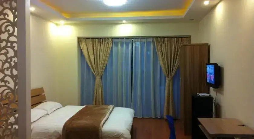 Куньмин: Kunming IC Holiday SOHO Junyuan Serviced Apartments