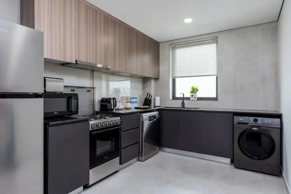 Дубай: Waves - Stylish 1BR Close to IMG World & Global Village