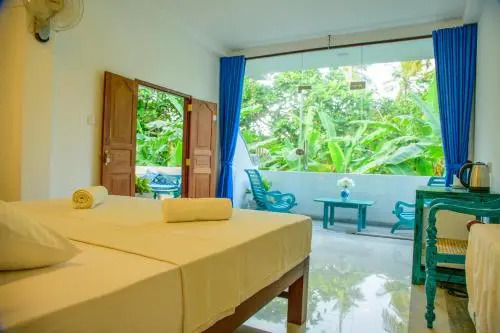 Хиккадува: Doors Guest House & Cafe
