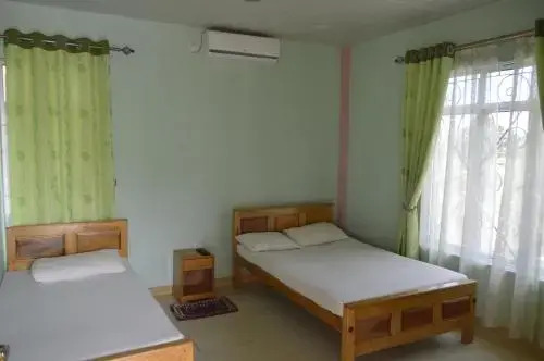 Калкудах: Gnanam Holiday Inn
