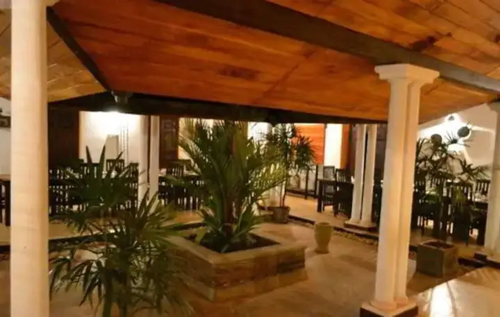 Чуннакам: The Margosa Villa