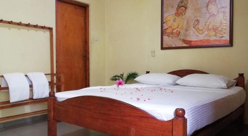 Полоннарува: Palm Garden Tourist Guest House